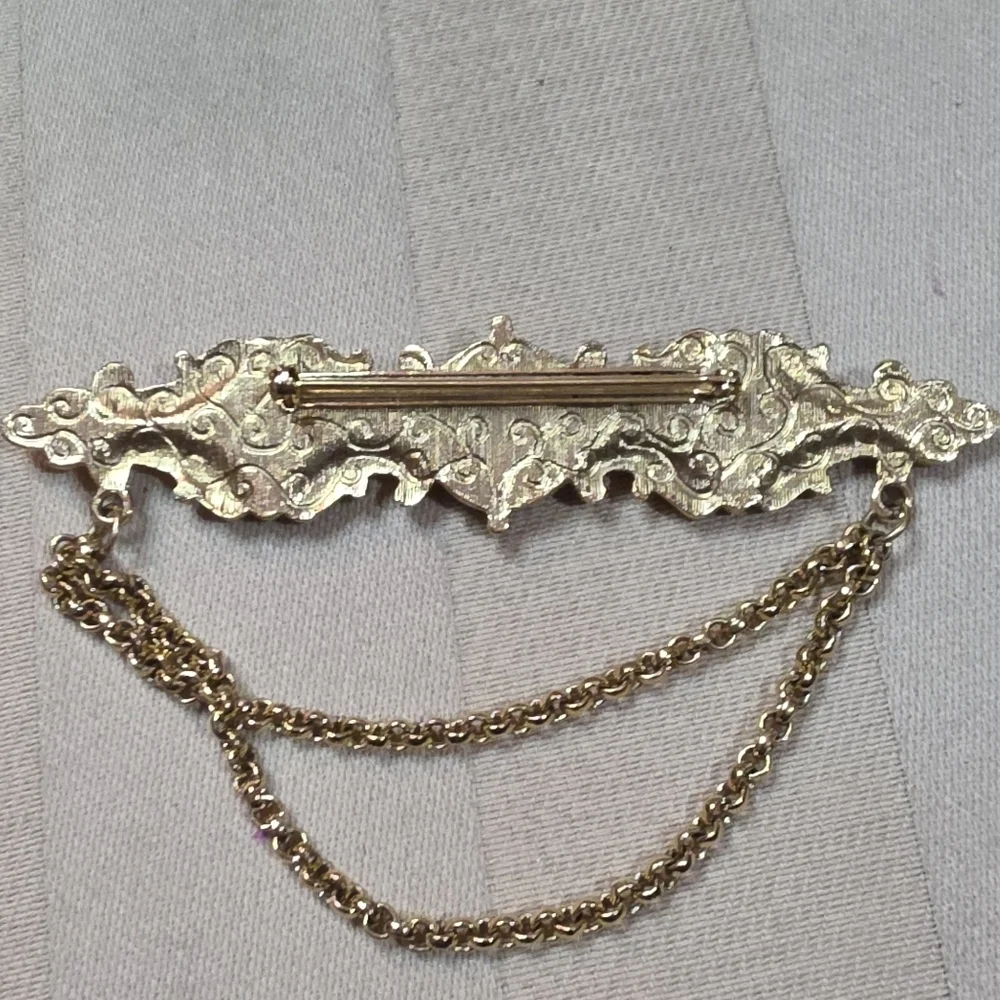 1928 beast brooches
